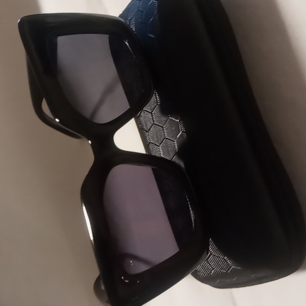 little black dress of sunglasses a thick resin frame durable smooth hinge action